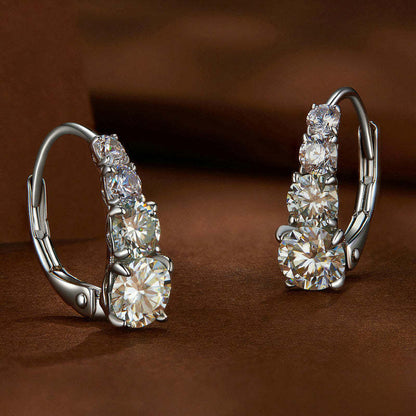 Carol four stone earrings | White gold 16k