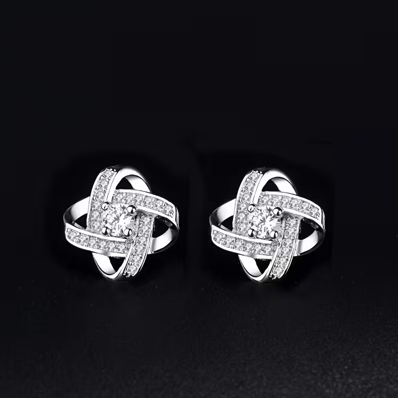 Twisted Orbit Silver Earrings