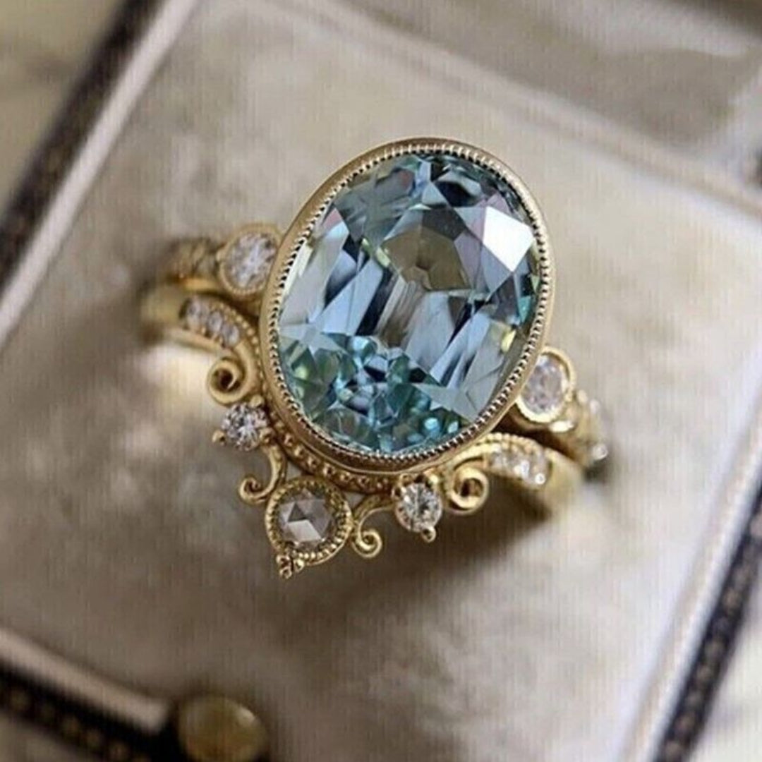 Elegant Blue Glass Golden Ring
